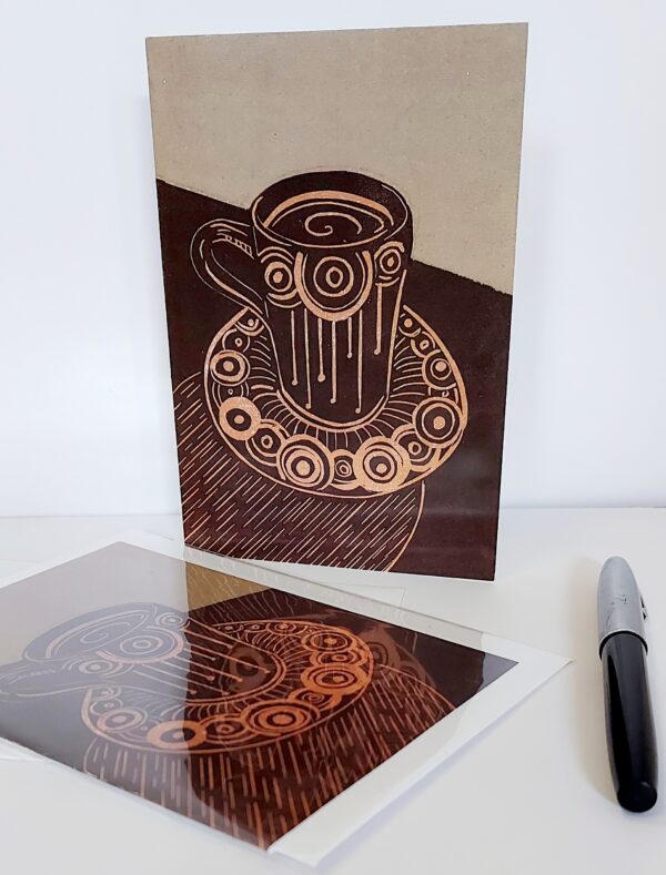 Two blank greeting cards depicting a vintage coffee cup from an original lino print by Dehlia Barnard=Edmunds AKA the Merryweather Artist